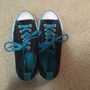 Blue and black Converse All Star